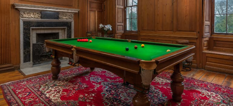 Pool table components prepared for a moving quote