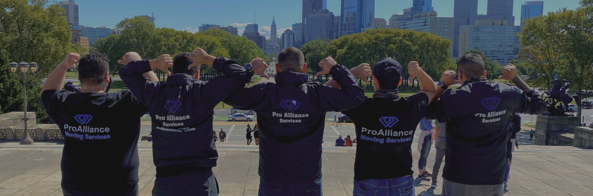 The Pro Alliance Services crew in branded jackets at the end of a job