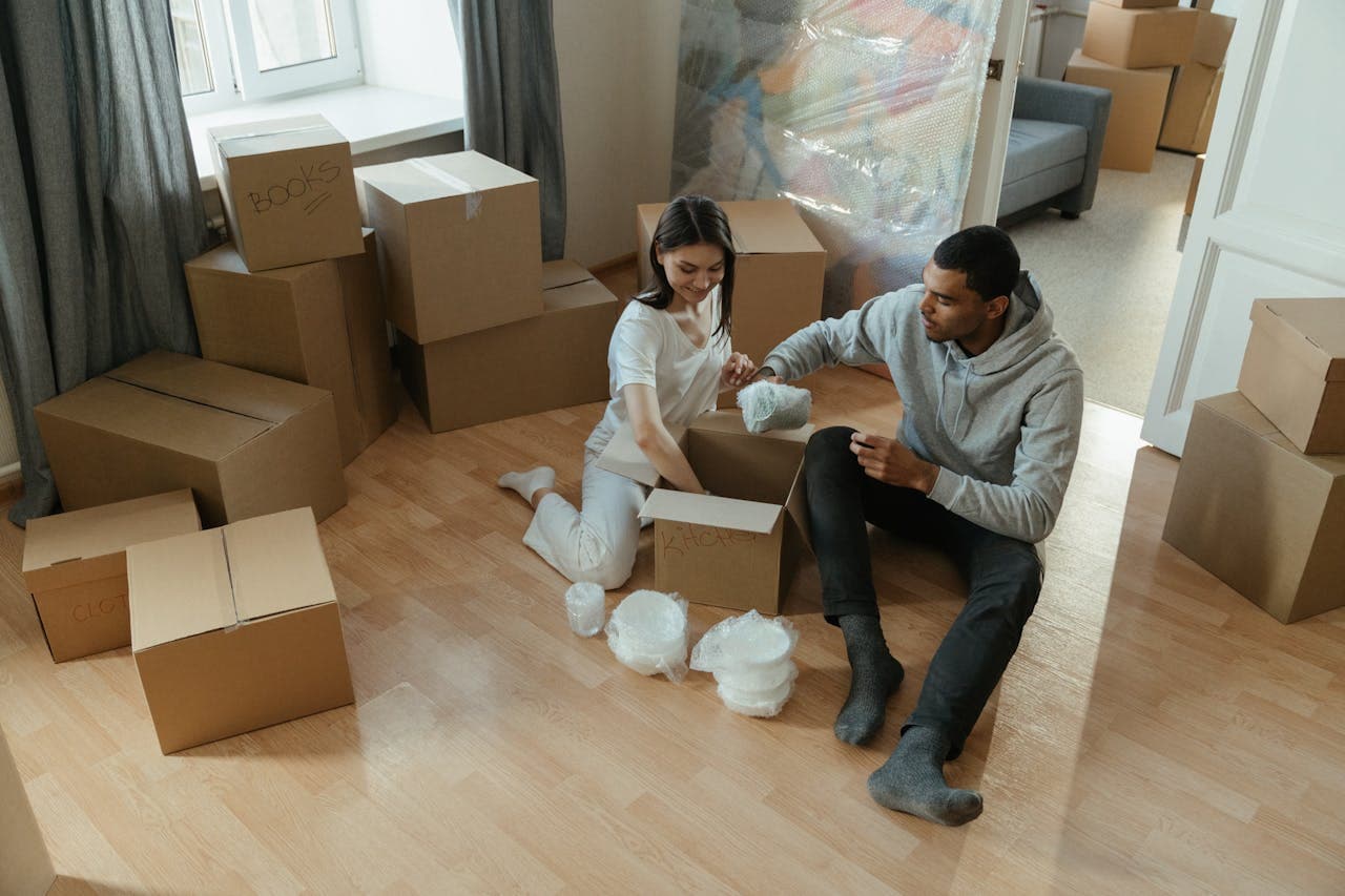 A couple packing before moving to Hondo