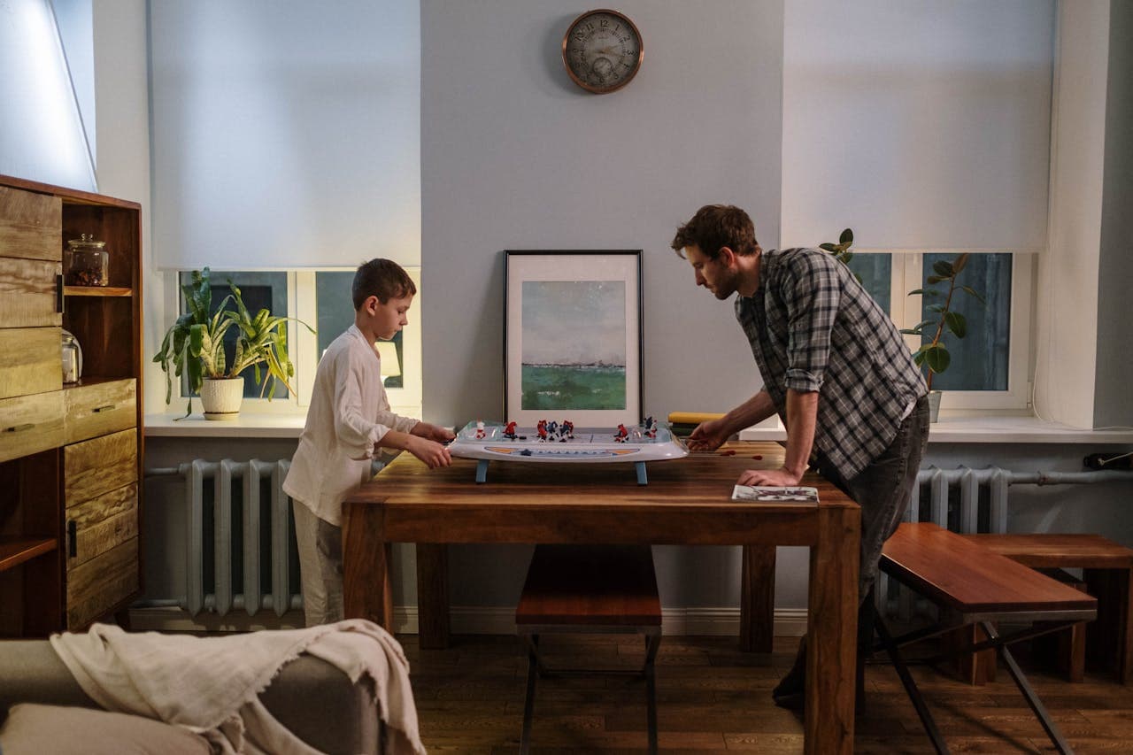 Father and a son playing a game