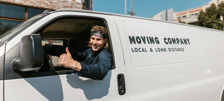 Moving truck and crew preparing for an Austin move