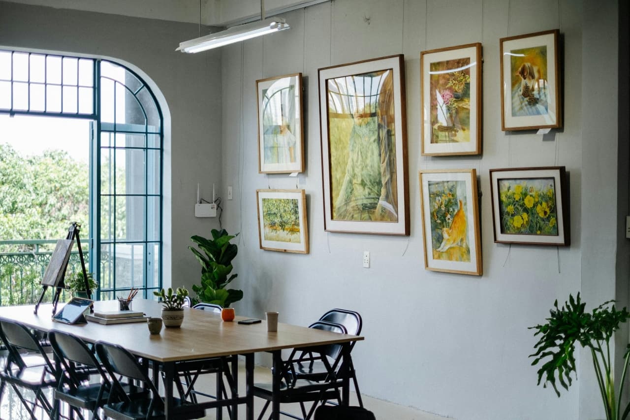Room with Large Table and Paintings on Wall