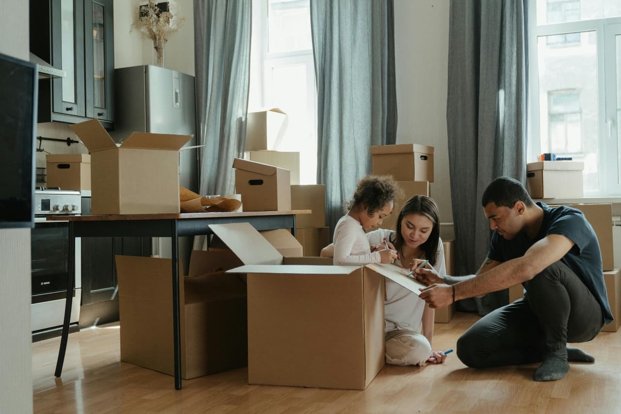 the family packing boxes