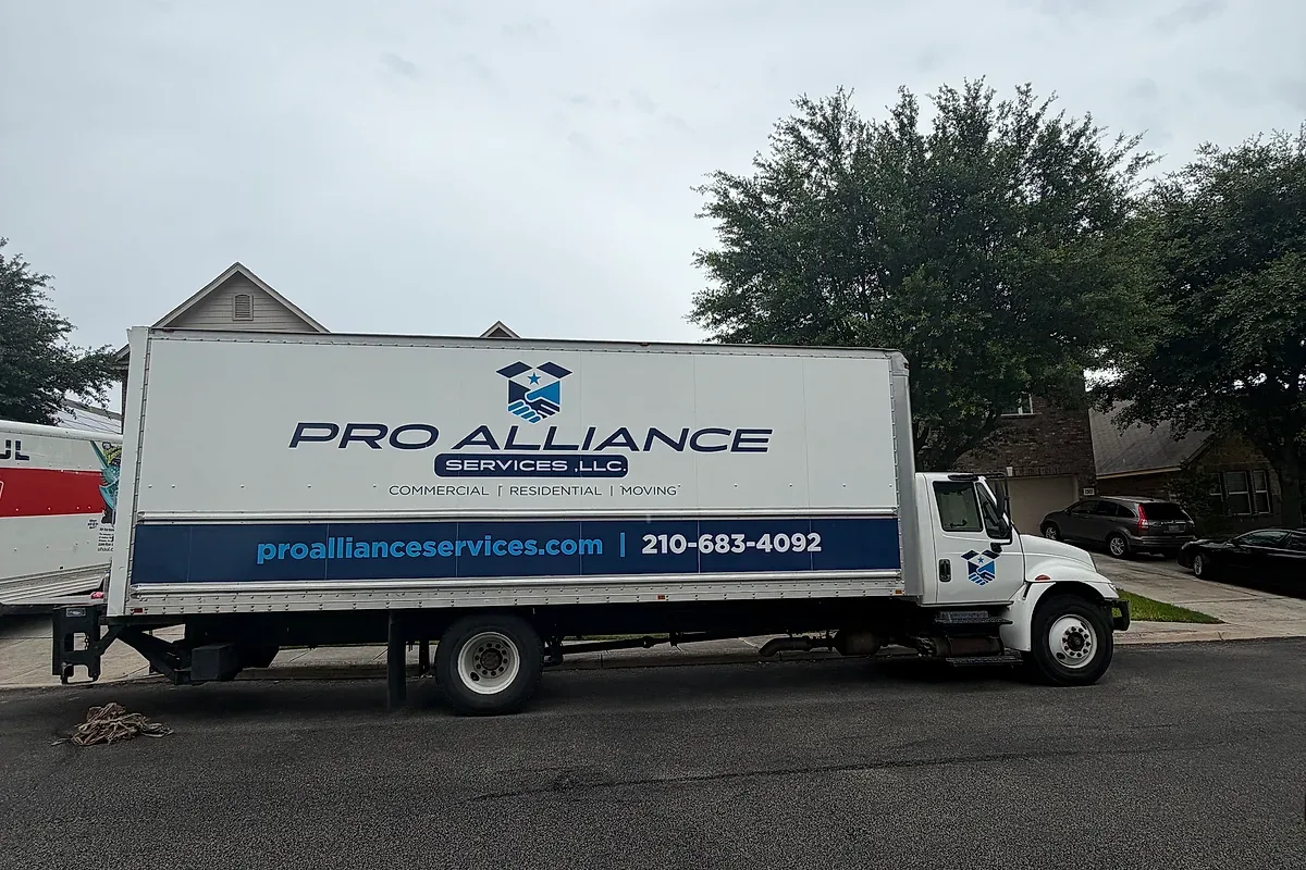 A box truck parked on a residential street