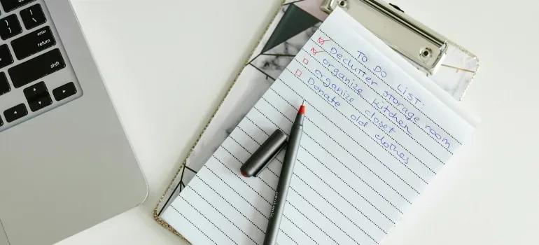 A written schedule beside an elevator lobby