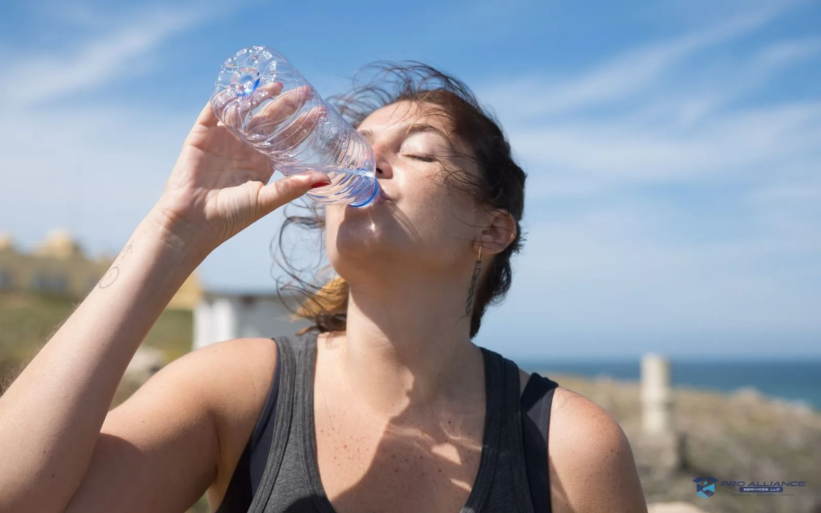 Water bottles set out during a break on a bright day