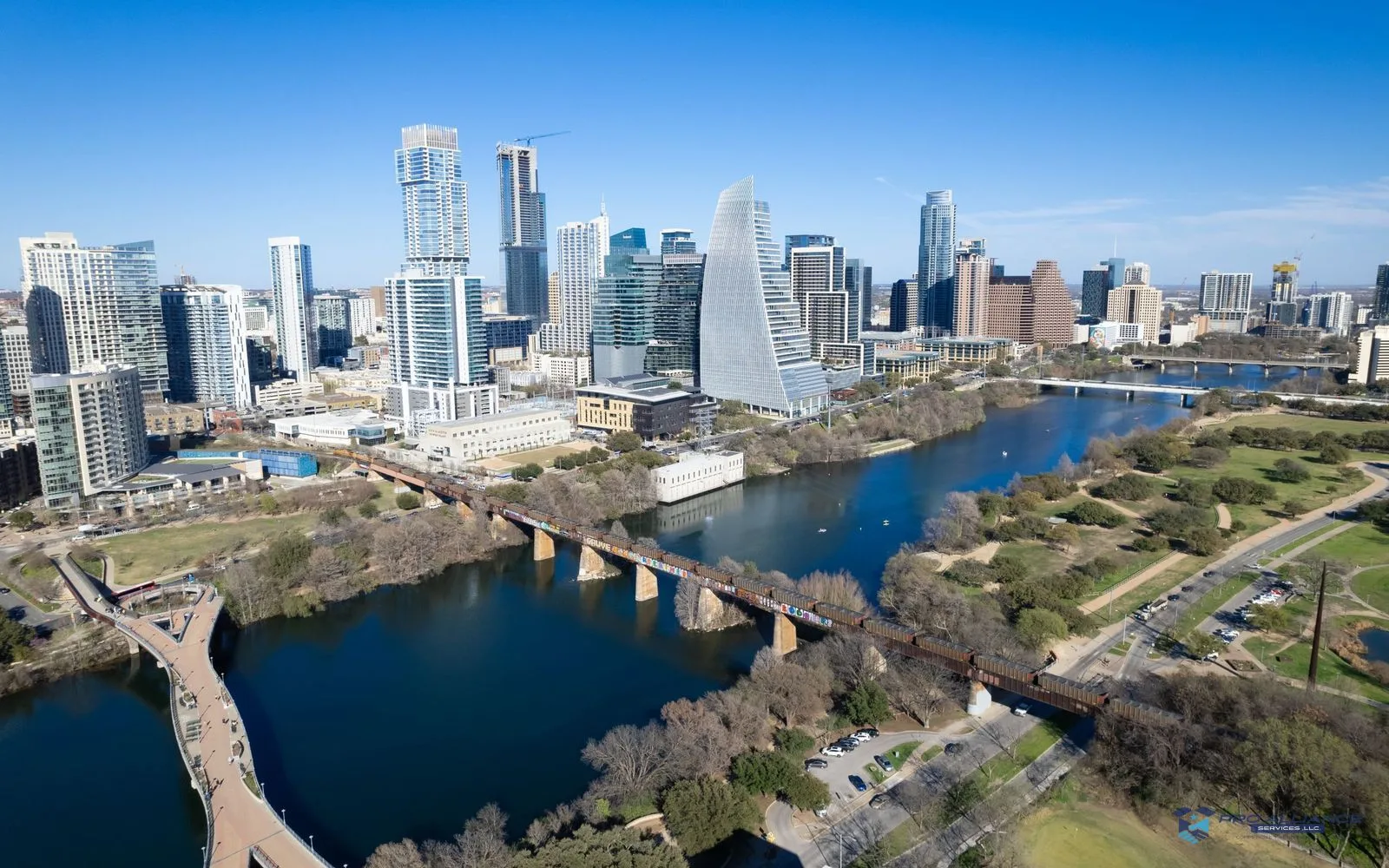 An aerial view of the downtown Austin skyline and Lady Bird Lake