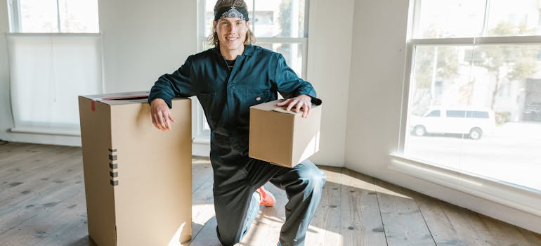 our San Antonio apartment mover holding boxes
