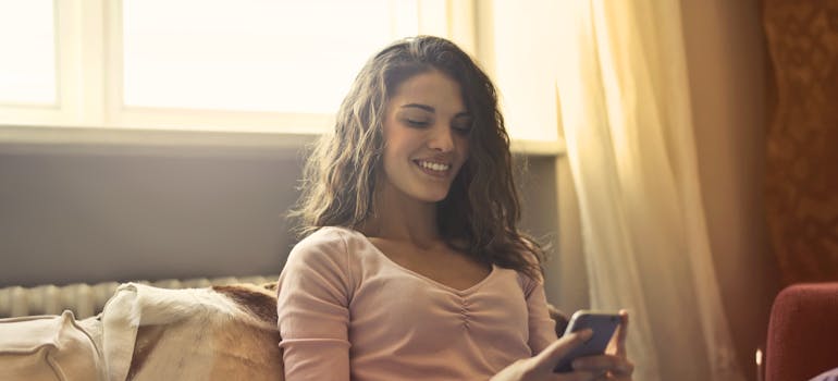 A woman holding a phone