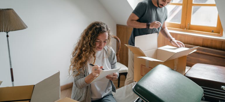 A couple writing a checklist