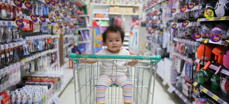 Child in a shopping cart