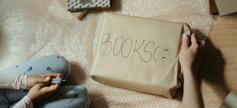 Packing paper with a label that says books