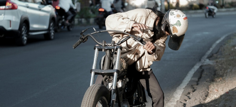 a girl driving bike prior to move to San Antonio from surrounding states