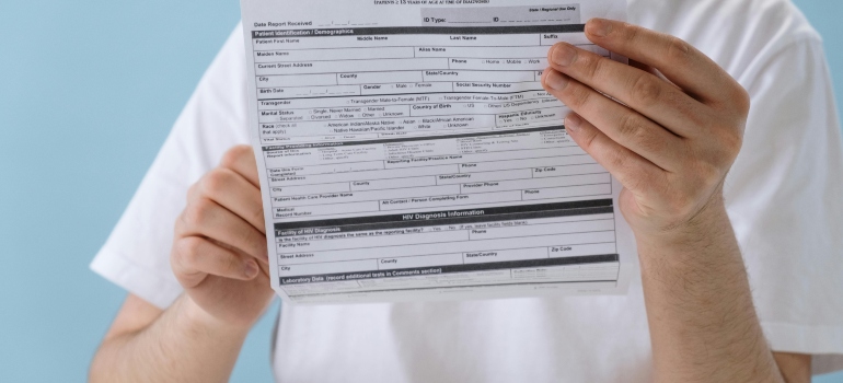 Close-up of confidential medical forms prepared for protected transport.