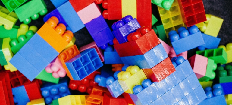 Colorful building blocks ready for packing toys safely for moving.